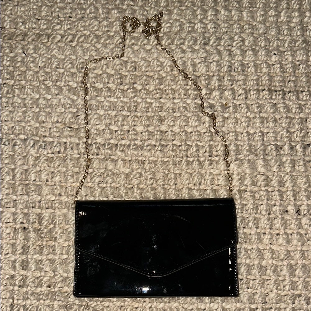 STEVE MADDEN Elegant Black Clutch with Gold Chain